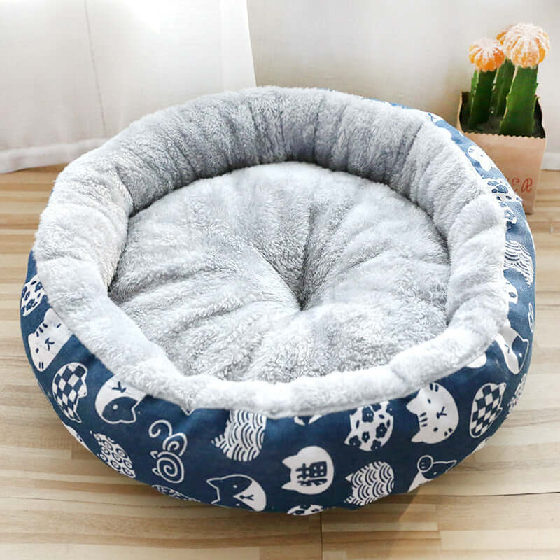 Padded pet litter bed made with soft Arctic fleece and cartoon patterns, perfect for small dogs and cats.
