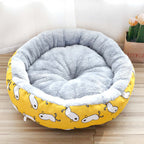 Padded pet litter bed made from Arctic fleece with cartoon patterns, perfect for dogs and cats, offering cozy comfort.