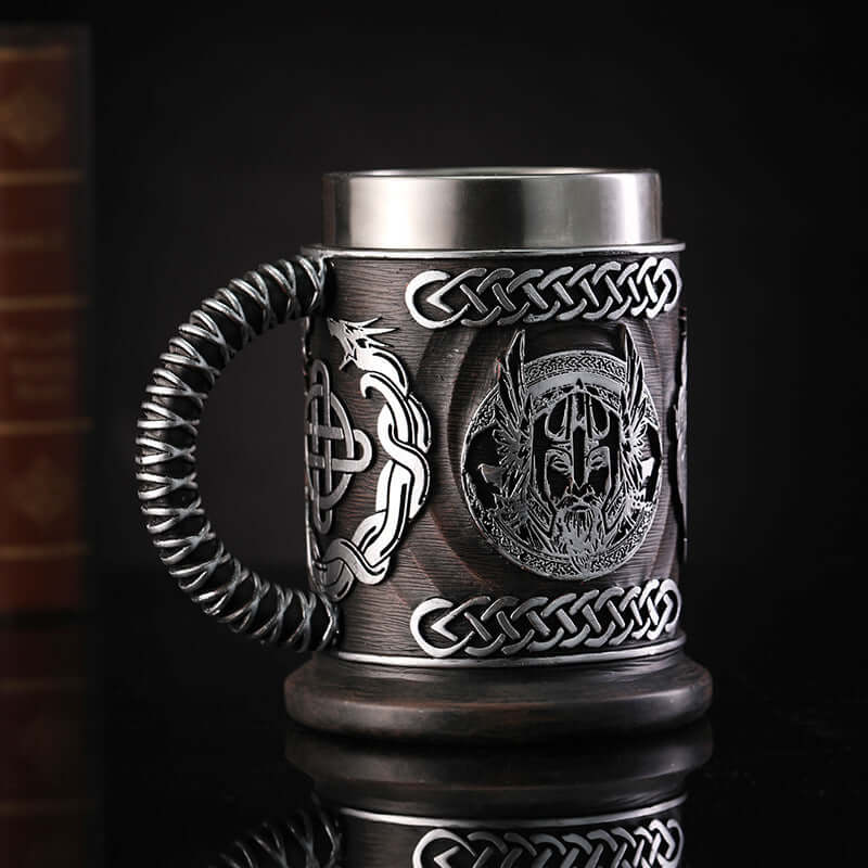 Minimalist beer mugs featuring a God of War inspired design with intricate details and stainless steel finish.
