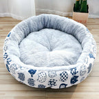 Padded pet litter bed made of soft fleece with cute cartoon patterns, perfect for dogs and cats in various sizes.