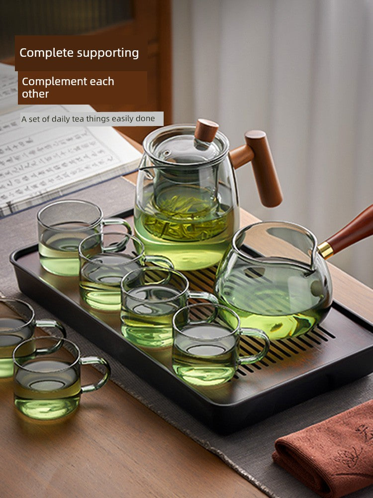 Elegant Japanese ceramic tea set with teapot and cups, perfect for afternoon tea or office use.
